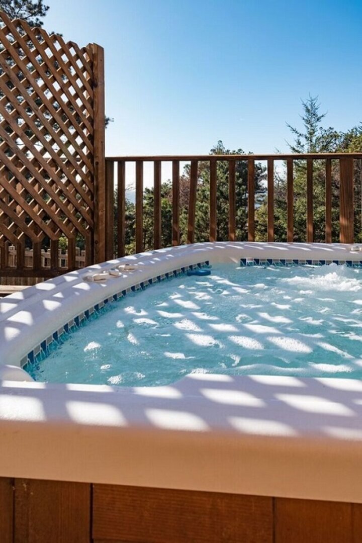 The hot tub enjoys ocean views