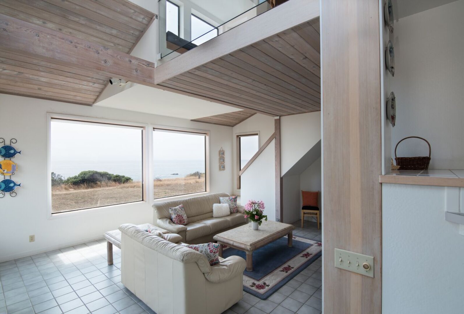 This bright and open living room is welcoming & comfortable